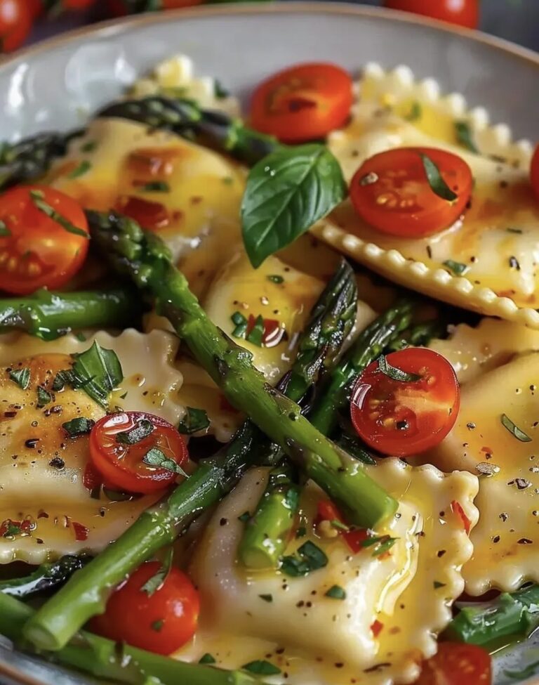 Ravioli With Tomatoes, Asparagus, Garlic, And Herbs Recipe